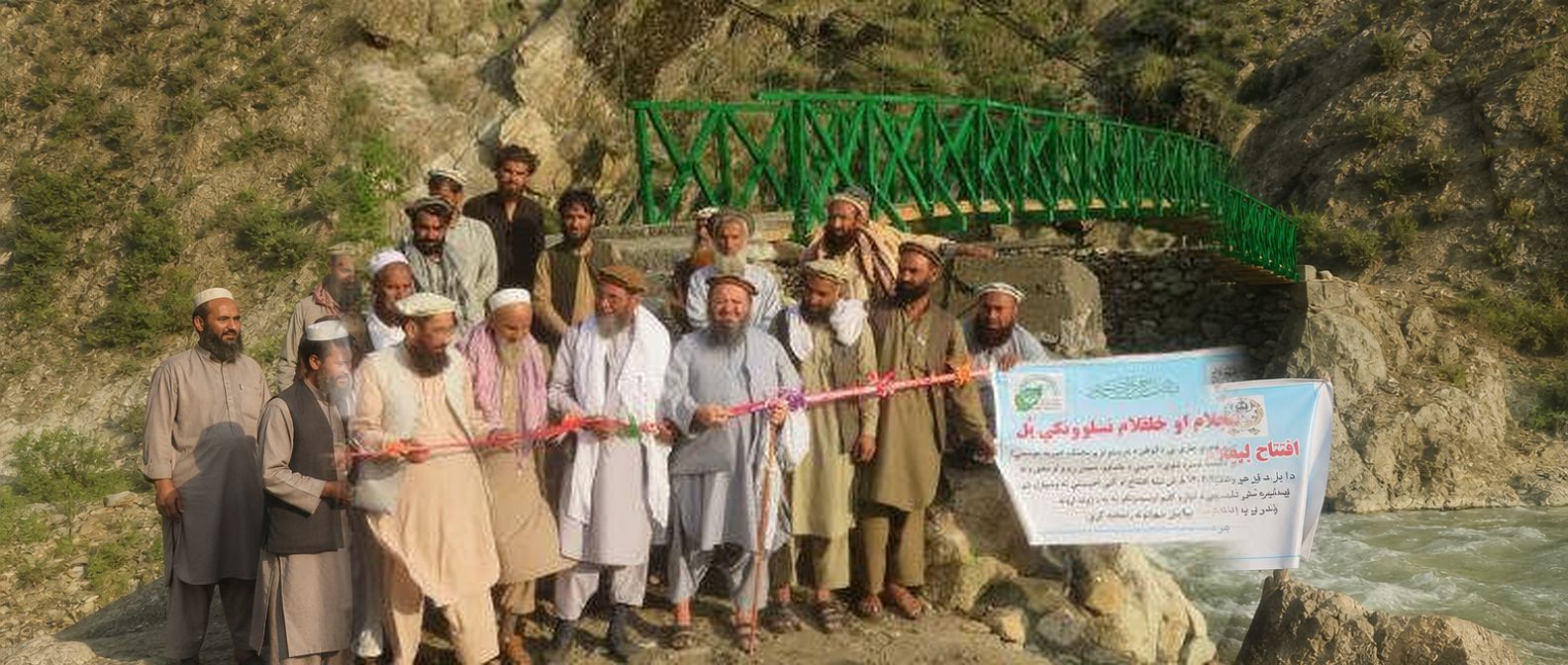 Construction of a bridge over the river for a village