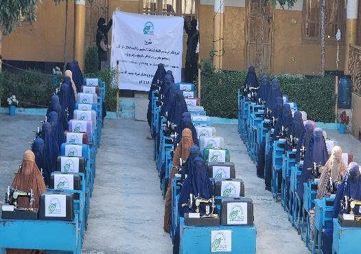 Training courses and distribution of sewing machines for women