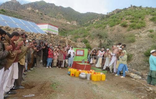 Well with water tank and solar energy system